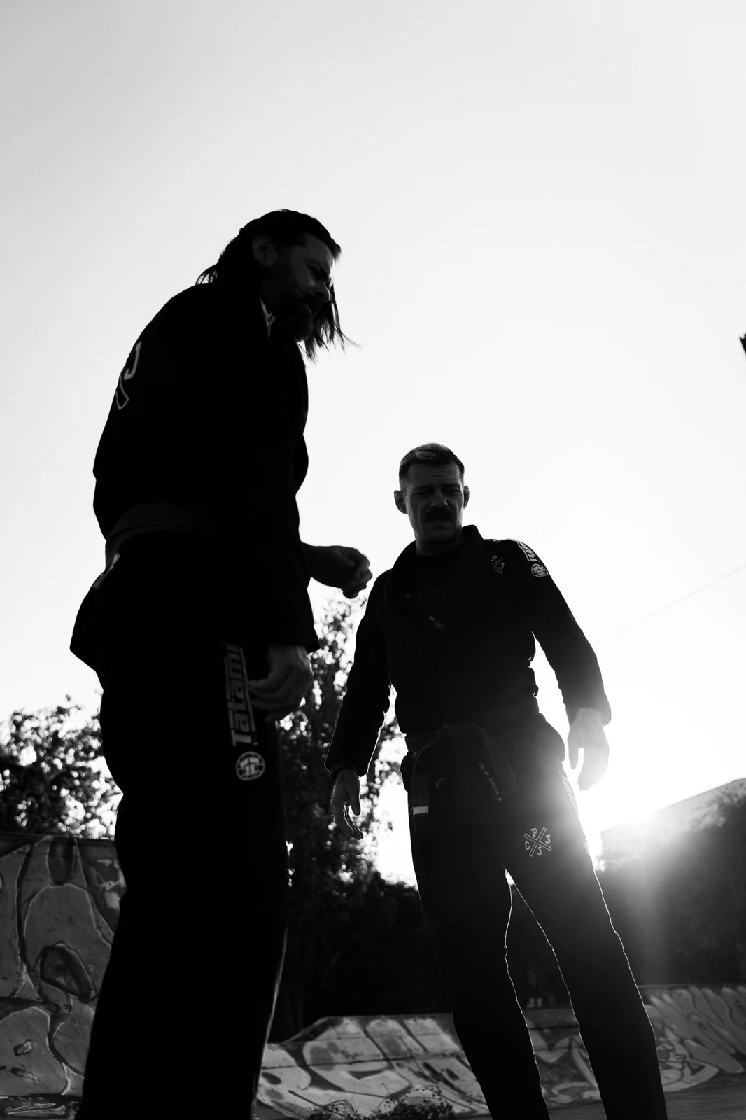 Constant Pressure Jiu Jitsu athletes captured in cinematic black-and-white photography